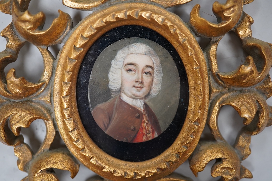 Mid 18th century School, Portrait miniature of a gentleman wearing a frock coat and wig, on ivory, housed in a modern Florentine style gilt frame, overall 13cm high, CITES Submission reference L32N1DB6